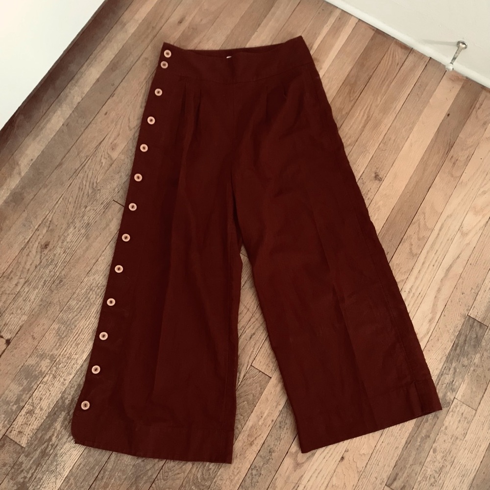 Anthropologie High-Rise, Wide Leg, Linen-Cotton Blend Pants with button up leg.